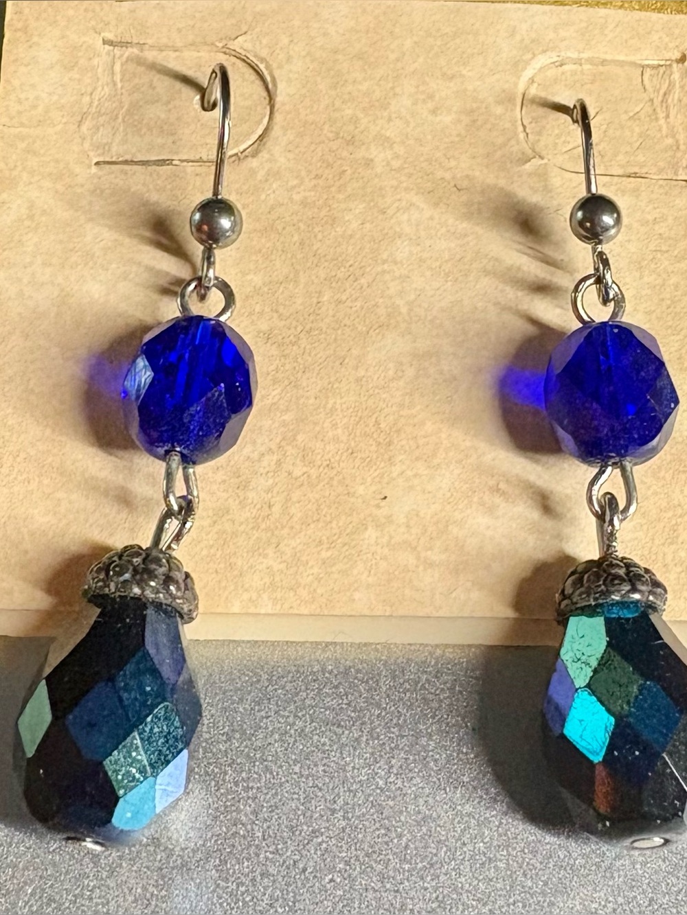 Vintage Chico’s dangle earrings: blue and prism acorn beads w silver toned HW.